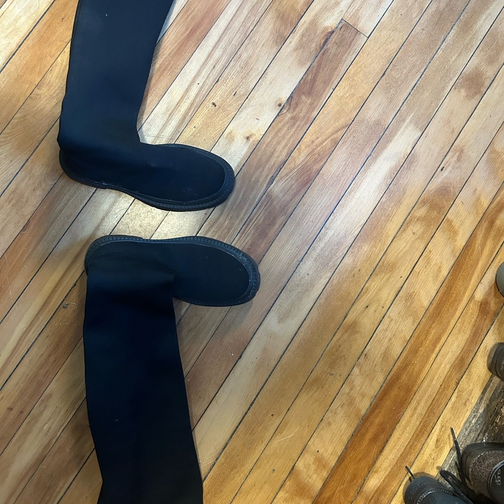 Long thigh high sick boots
